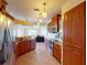 Open kitchen with granite counters, stainless steel appliances, and breakfast bar at 158 Eppinger Dr, Port Charlotte, FL 33953