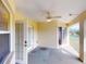 Covered lanai with sliding glass doors and carpet at 158 Eppinger Dr, Port Charlotte, FL 33953