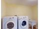 Laundry room with washer, dryer, and utility sink at 158 Eppinger Dr, Port Charlotte, FL 33953