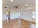 Bright living room with hardwood floors and ceiling fan at 158 Eppinger Dr, Port Charlotte, FL 33953