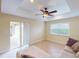 Living room with access to backyard patio and ceiling fan at 158 Eppinger Dr, Port Charlotte, FL 33953