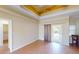 Living room with sliding glass doors, tile flooring, and access to a walk-in closet at 158 Eppinger Dr, Port Charlotte, FL 33953