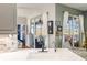 Kitchen sink with modern faucet and a view of the living room and backyard through sliding glass doors at 1688 Piccadilly Cir, Punta Gorda, FL 33980