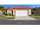 Single-car garage and front exterior of the home at 1780 Deborah Dr # 6, Punta Gorda, FL 33950