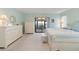 Main bedroom with sliding glass doors leading to a private outdoor space at 1780 Deborah Dr # 6, Punta Gorda, FL 33950