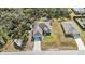Elevated view of the home's backyard with pool and landscaping at 18359 Gypsy Ave, Port Charlotte, FL 33954