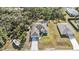 Aerial view of the backyard, pool, and surrounding homes at 18359 Gypsy Ave, Port Charlotte, FL 33954