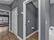 View of the hallway leading to a bathroom and another room at 18359 Gypsy Ave, Port Charlotte, FL 33954