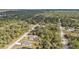 Elevated view of homes in a green residential setting at 18359 Gypsy Ave, Port Charlotte, FL 33954