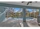 Screened-in pool with views of the surrounding trees at 18359 Gypsy Ave, Port Charlotte, FL 33954