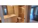 Clean bathroom boasts a white vanity, tiled shower, and toilet at 197 Tropicana Dr # 1512, Punta Gorda, FL 33950