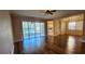 Living room with wood floors, sliding glass doors to patio, and view of the water at 197 Tropicana Dr # 1512, Punta Gorda, FL 33950