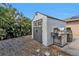 Storage shed and grill in a well-maintained backyard space at 23309 Hartley Ave, Port Charlotte, FL 33954