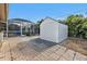 White shed in backyard next to pool and patio at 23309 Hartley Ave, Port Charlotte, FL 33954