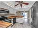 Kitchen featuring modern appliances, ample counter space, and stylish flooring at 23309 Hartley Ave, Port Charlotte, FL 33954