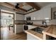 Bright kitchen with butcher block countertops, stainless appliances and wood beam accents at 23309 Hartley Ave, Port Charlotte, FL 33954