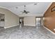 Bright living room with tile floors and access to other rooms at 23309 Hartley Ave, Port Charlotte, FL 33954