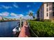 Scenic dock with boat slip and lush landscaping at 25188 Marion Ave # A108, Punta Gorda, FL 33950