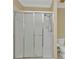 Spacious tiled walk-in shower with sliding glass doors at 26090 Huanuco Dr, Punta Gorda, FL 33983