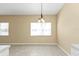 Bright dining area with tile floors and chandelier at 26090 Huanuco Dr, Punta Gorda, FL 33983