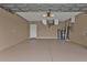 Spacious two-car garage with a concrete floor at 26090 Huanuco Dr, Punta Gorda, FL 33983
