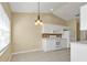 Spacious kitchen with white cabinets and tile flooring at 26090 Huanuco Dr, Punta Gorda, FL 33983