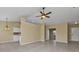 Open living area with tile floors and high ceilings at 26090 Huanuco Dr, Punta Gorda, FL 33983