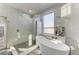 Elegant bathroom featuring a soaking tub and walk-in shower at 276 Lewis Cir # 112, Punta Gorda, FL 33950