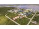 Single-Gathering home on a waterfront lot, showcasing surrounding area at 2877 Howe Rd, Port Charlotte, FL 33981