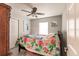 Bedroom with ceiling fan and floral bedding at 2877 Howe Rd, Port Charlotte, FL 33981