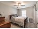Spacious bedroom with a ceiling fan and ample closet space at 2877 Howe Rd, Port Charlotte, FL 33981