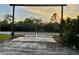 Ornate metal gates, adding a touch of elegance and security to the property's entrance at 2877 Howe Rd, Port Charlotte, FL 33981