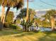 View of a canal with docks and lush greenery from the property at 2877 Howe Rd, Port Charlotte, FL 33981