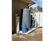 Home water system components, including a large storage tank and filtration equipment at 3100 Sheboygan Ave, North Port, FL 34286