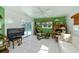 Bright Gathering room features a view of the pool and sliding glass doors at 3262 Steadman St, Punta Gorda, FL 33980