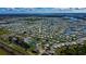 Aerial view of community and waterfront at 368 Catamaran Ct, North Port, FL 34287