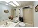 Bathroom with tub shower, toilet and sink at 368 Catamaran Ct, North Port, FL 34287