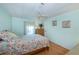 Bright bedroom with a double bed, dresser, and window at 368 Catamaran Ct, North Port, FL 34287