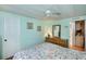 Bedroom with double bed, dresser and ensuite access at 368 Catamaran Ct, North Port, FL 34287