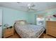 Bedroom with double bed and wicker furniture at 368 Catamaran Ct, North Port, FL 34287