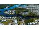 Aerial view of waterfront community with many homes at 368 Catamaran Ct, North Port, FL 34287