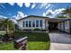 Mobile home exterior with a well-manicured lawn at 368 Catamaran Ct, North Port, FL 34287