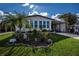 Single-wide home with landscaped yard at 368 Catamaran Ct, North Port, FL 34287