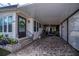 Florida mobile home with carport and landscaped yard at 368 Catamaran Ct, North Port, FL 34287