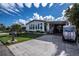 Front view of a mobile home in a community at 368 Catamaran Ct, North Port, FL 34287