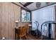 Bright home gym with exercise equipment and a small workspace at 368 Catamaran Ct, North Port, FL 34287