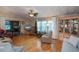 Spacious living room with ample seating and wood flooring at 368 Catamaran Ct, North Port, FL 34287