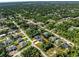 Aerial view highlighting a specific property within a residential neighborhood at 4301 Marcella Ter, North Port, FL 34286