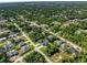 An aerial view of a residential neighborhood with many single-Gathering houses at 4301 Marcella Ter, North Port, FL 34286