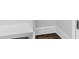 White baseboard detail and built-in shelving unit in a modern interior at 4301 Marcella Ter, North Port, FL 34286